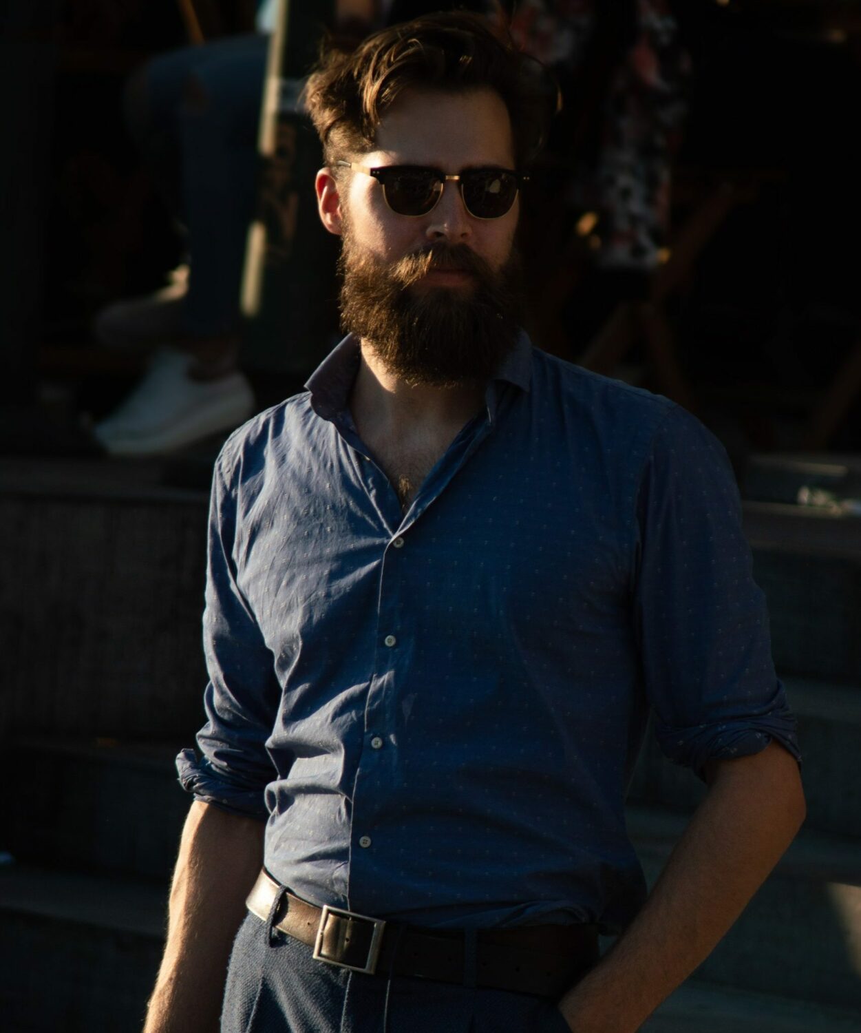 beard man with sunglasses walking
